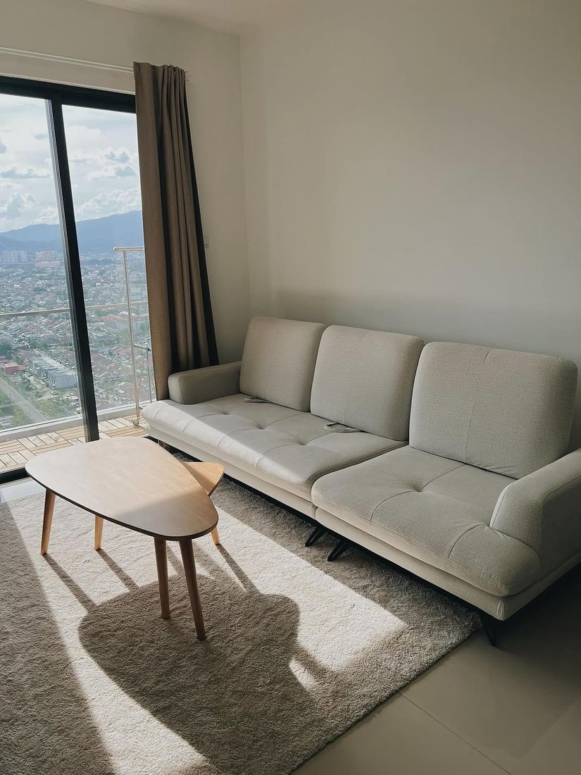 Chic Est hotel suite living area with city view