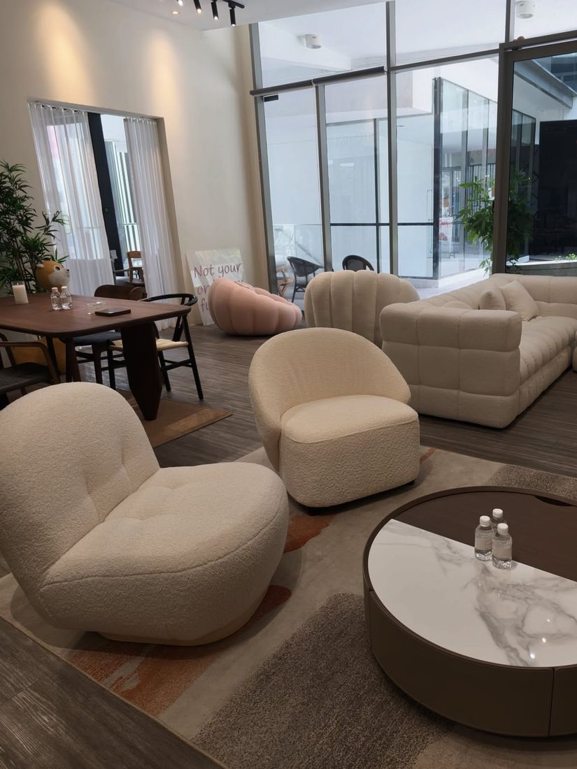 Chic Est showroom lounge with boucle lounge chairs